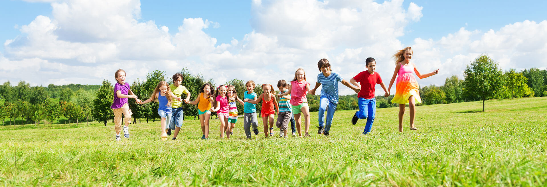 Kids running in field